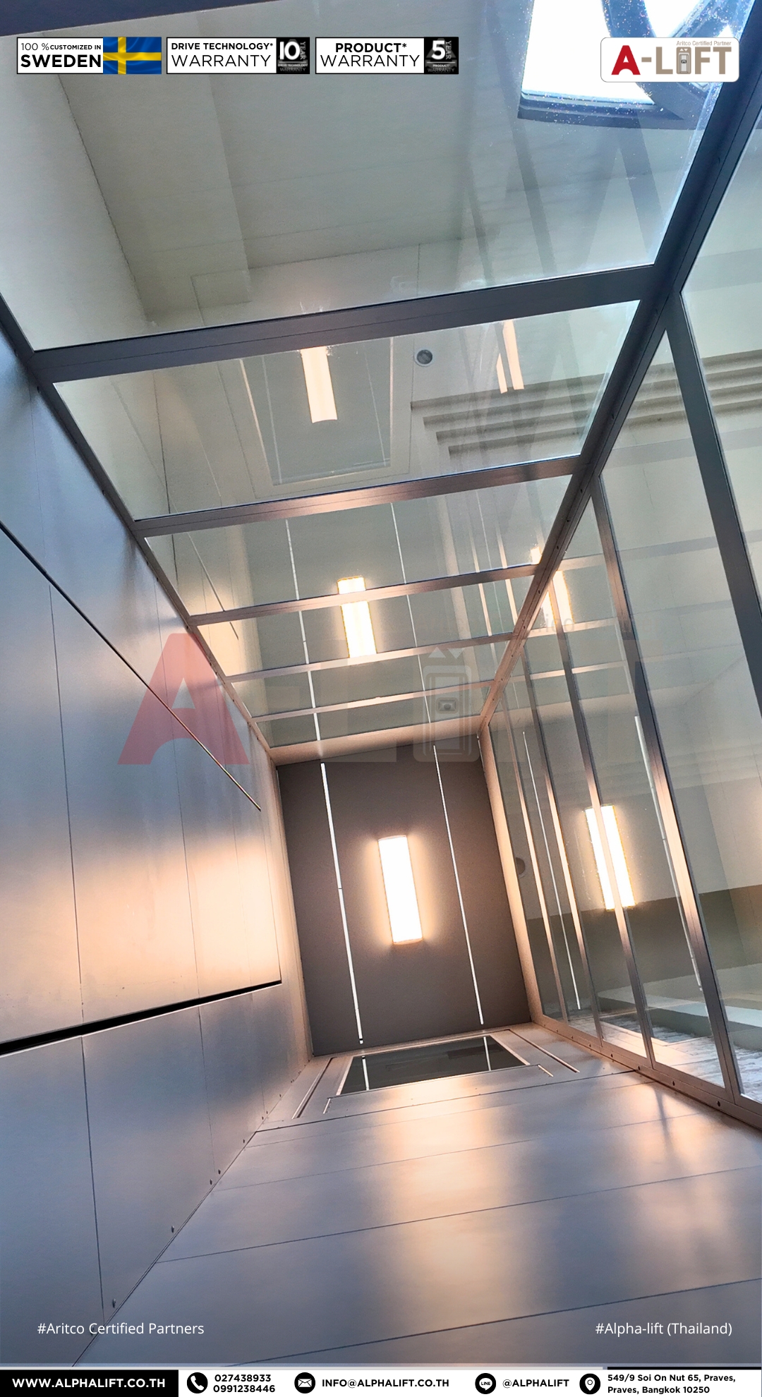 ภายในลิฟต์โดยสารสาธารณะ Aritco PublicLift Access พร้อมผนังกระจกและไฟเพดานดีไซน์พรีเมียม ที่คลับเฮาส์ลำลูกกา